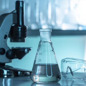 laboratory glassware and microscope arrangement 1